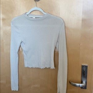 Knit sweater with high neck